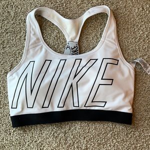 Nike, white and black sports bra. Only worn once.